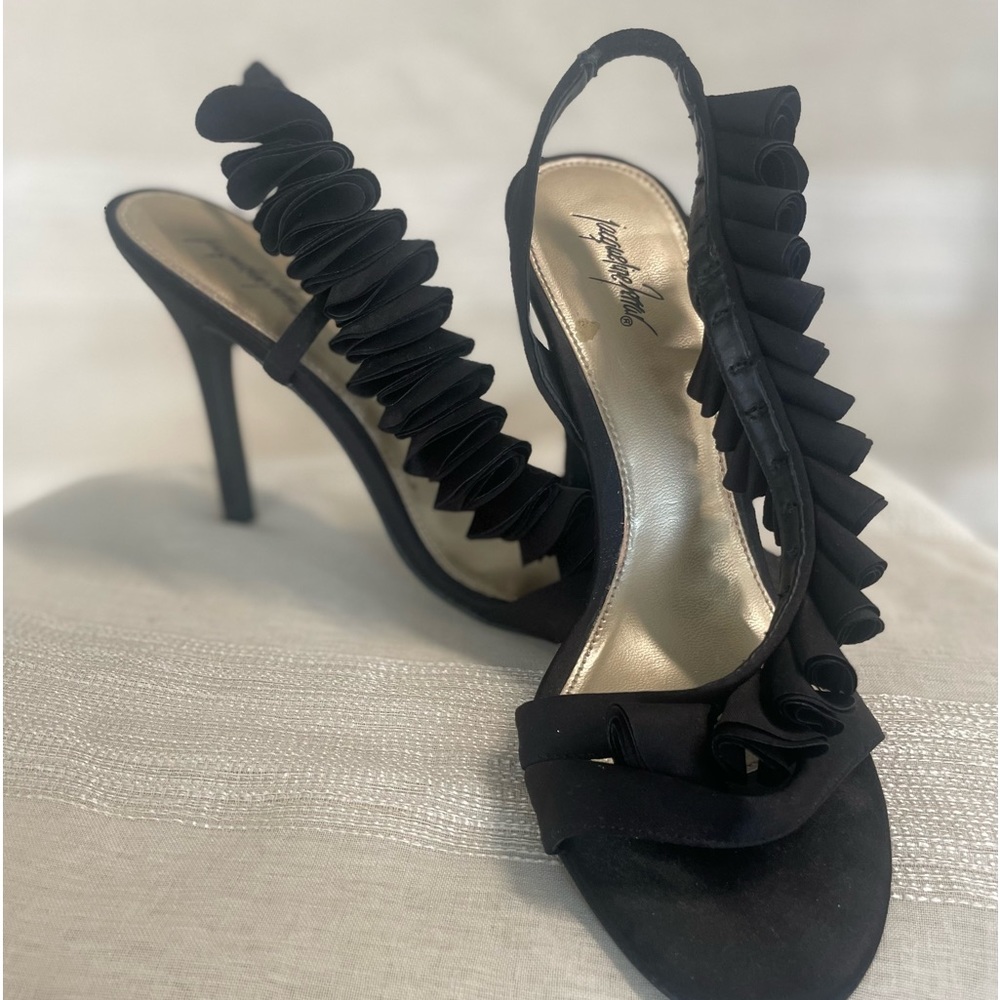 Dressy black with a decorative strap coming all way up to ankle